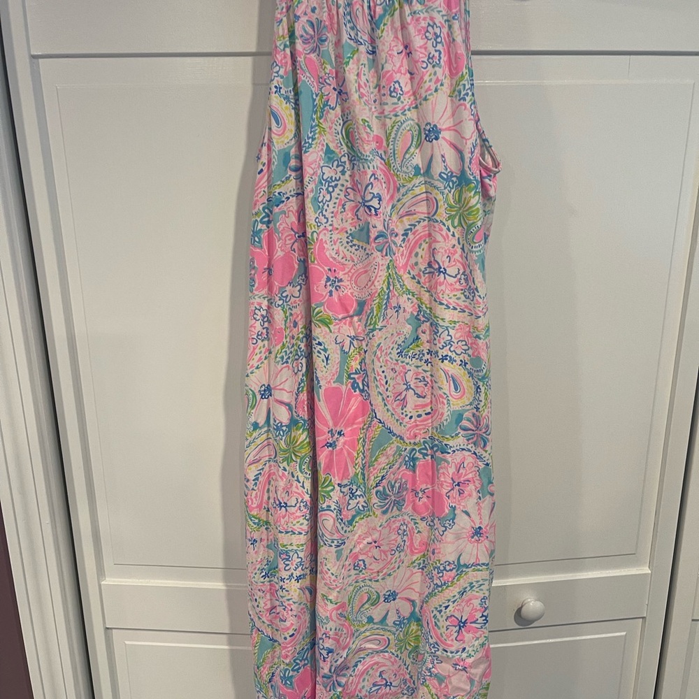 Lilly Pulitzer sleeveless floral dress slit on side at bottom of dress.